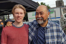 PictureWilliam Healy with Paul Sun-Hyung Lee on the set of Kim's Convenience